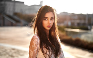 Woman long hair city sidewalk - natural free wallpaper