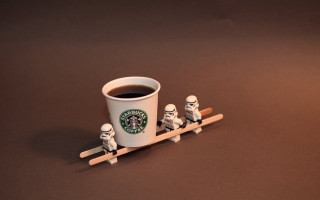 Coffee figurines sled cup winter - a tilt shift photo free wallpaper