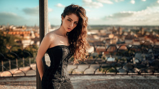 Woman corset balcony cityscape river - a woman in a corset free wallpaper