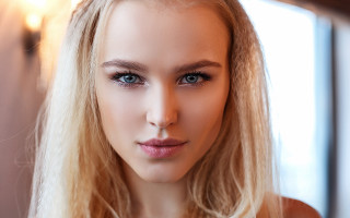 Blonde woman blue eyes window 2 - a window behind her free wallpaper