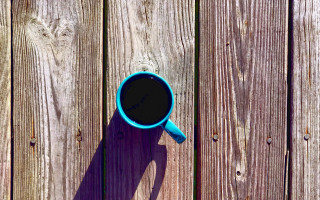 Blue coffee cup wooden table - a wooden table next free wallpaper