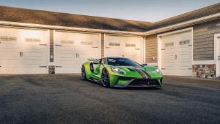 Green sports car garage door - side profile free wallpaper