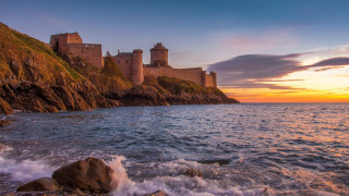 Castle cliff ocean sunset waves - dali free wallpaper