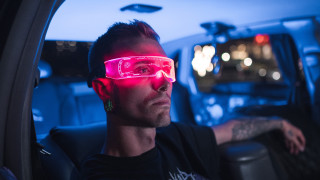 Man pink glasses car night - cyberpunk style free wallpaper