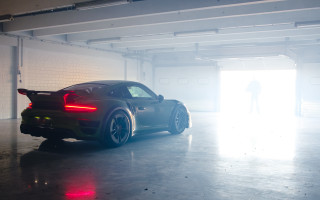 Garage hologram rain vroom anamorphic - a white brick wall free wallpaper