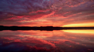 Sunset water reflection clouds cityscape - widescreen free wallpaper for desktop