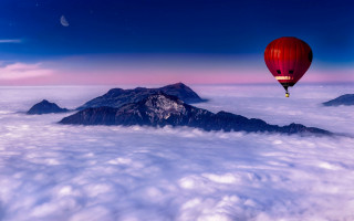 Hot air balloon mountains night - a hot air balloon free wallpaper