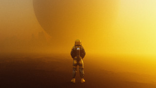 Space suit man yellow haze - a large object in the background free wallpaper
