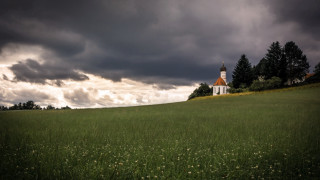 Church hill stormy sky flowers - a church free wallpaper