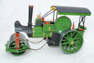 Green toy train chain front - wheel free wallpaper