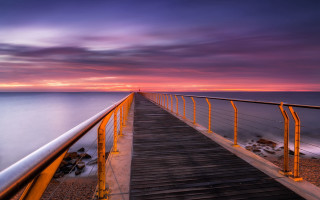 Wooden walkway ocean sunset purple - a purple sky free wallpaper