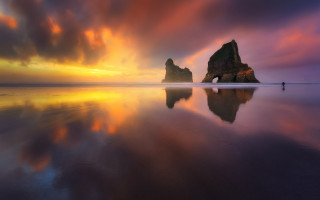 Beach rock formation sunset mountain - mystical free wallpaper for desktop