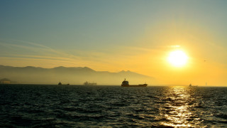 Sunset boat mountain ocean lake - exekia free wallpaper