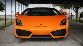 Bright orange sports car parking 4 - orange sports car free wallpaper