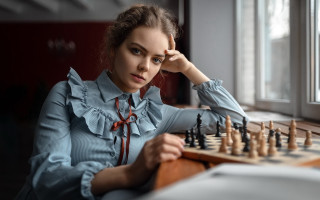 Woman chessboard table hand head - a woman sitting free wallpaper for desktop