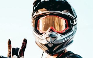 Man helmet goggles peace sign - full round face free wallpaper