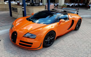 Bright orange sports car street 2 - table free wallpaper