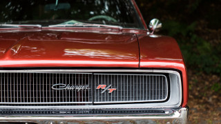 Red car wooded area photorealism - the front of its free wallpaper