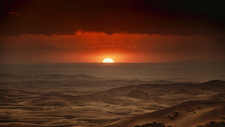 Desert sunset red sky clouds - a few hill free wallpaper