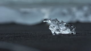 Ice black sand beach ocean - ice free wallpaper