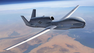 Large gray airplane flying mountains - the sky above a mountain range free wallpaper