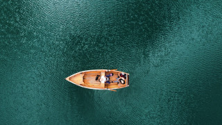 Small boat lake people blonde - a small boat free wallpaper