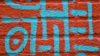 Redbrick bluegraffiti keepsmiling stopsign girl - a red brick wall free wallpaper