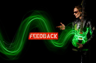 Man holding guitar pointing feedback - interactive free wallpaper