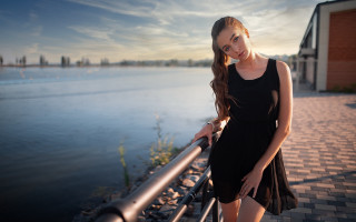 Woman railing sunset city beach - sunset time free wallpaper