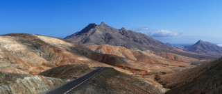 Mountain road landscape cloudy sky - mountainous free wallpaper