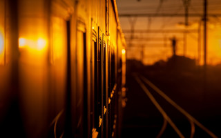 Train sunset backlighting blurry orange - the track free wallpaper