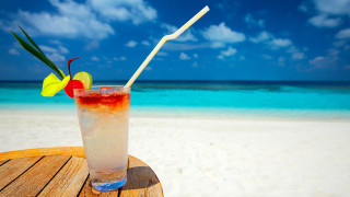 Beach drink table blue sky - a drink free wallpaper