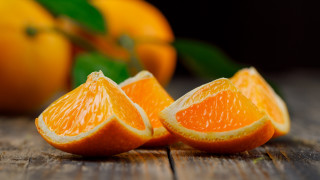 Oranges wooden table blurry food - a group of oranges free wallpaper