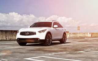 White infiniti parking lot clouds - andrew robertson free wallpaper