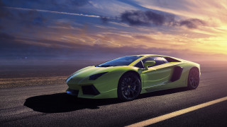 Green sports car sunset cloudy 2 - a green sports car free wallpaper