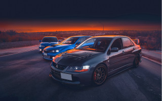 Cars sunset night puzzle cinematic - the sun setting behind them free wallpaper