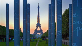 Eiffel tower poles grass urban - a view of the eiffel tower free wallpaper