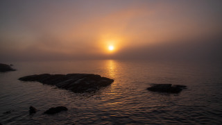 Sunset ocean island rocks clouds - a few rock free wallpaper