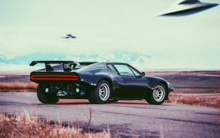 Black car road field flying - 1 9 7 0 s free wallpaper