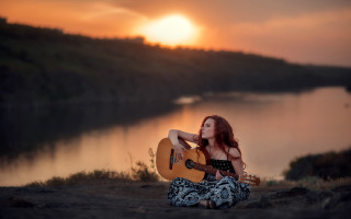 Woman sitting guitar sunset beach - a hill free wallpaper