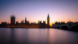 Castle clocktower bridge cityscape dusk - a clock tower in the middle of its free wallpaper