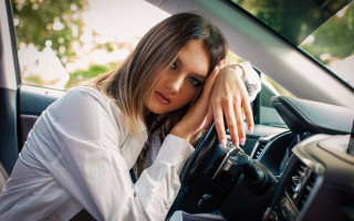 Woman car blurry depthoffield longhair - the steering wheel free wallpaper