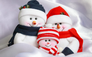 Three snowmen hats scarves painting - a white blanket free wallpaper