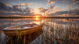 Small boat lake sunset bridge - a small boat free wallpaper
