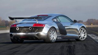 Silver sports car driving track - its hood free wallpaper