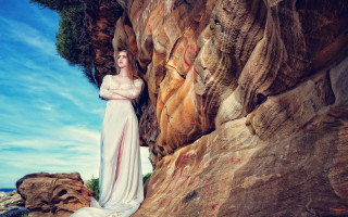 Woman white dress rock ocean - a cave painting free wallpaper for desktop