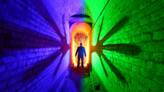 Man tunnel colorful light interactive - a colorful light free wallpaper