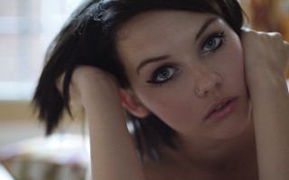 Woman short black hair blue - freckle free wallpaper