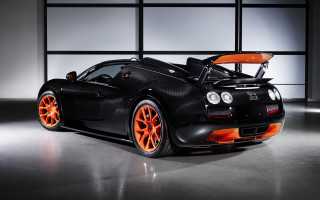 Black sports car orange wheels 2 - a large window behind free wallpaper