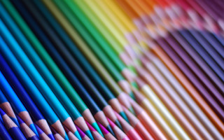 Rainbow colored pencils blurry background - pastell free wallpaper
